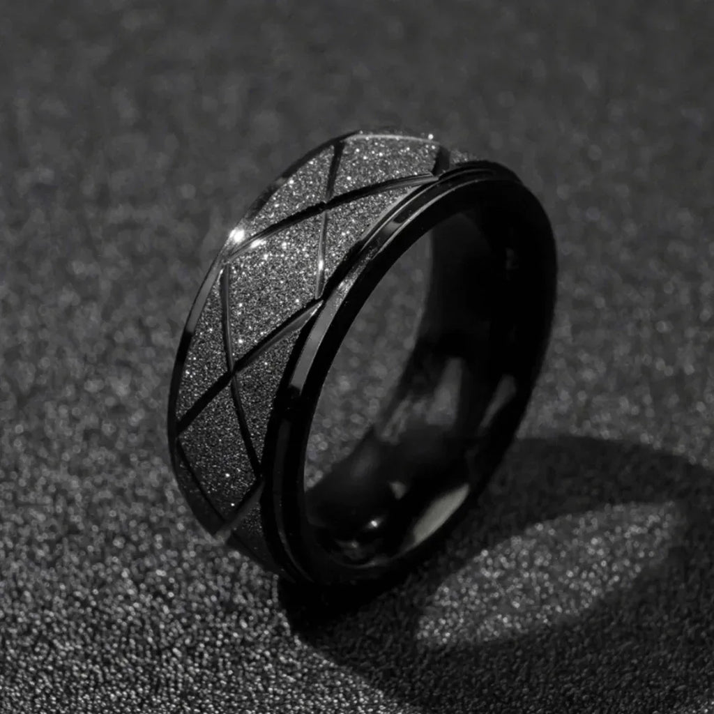 Man wearing waterproof black stardust ring on hand streetwear style